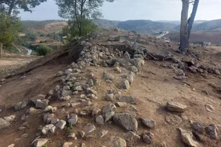 ancient rock wall that was once a defensive structure 