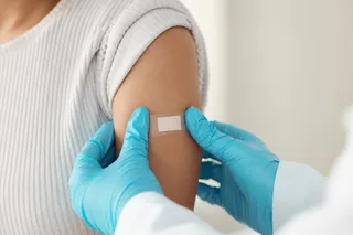 Doctor giving a person a flu shot