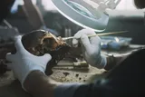 researcher looking at a human skull 