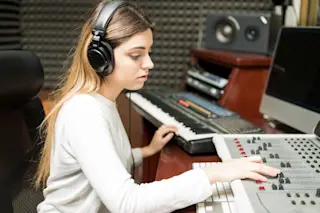 a producer mixing music using artificial intelligence