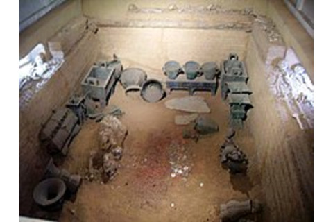The tomb of Lady Fu Hao at Yinxu. It contained 6 dog skeletons, 16 human slave skeletons, and numerous grave goods. (Credit: Wikimedia Commons)