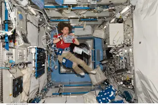 Cady Coleman wired up for a space-medicine experiment aboard the International Space Station during Expedition 26 in 2011. (Credit: NASA)