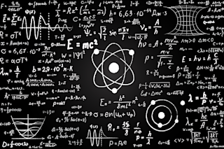 scientific formulas on a chalkboard - shutterstock 1698478423